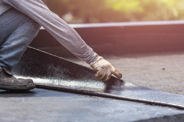 Professional Exterior Waterproofing technician working in Goldsmith, IN